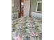 Bright bedroom with access to another room and white wooden accents at 2668 Jablo Cir, North Port, FL 34288