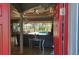 A view from the open front door looking into the living area with a pool view at 2668 Jablo Cir, North Port, FL 34288