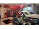 Large garage showcasing a classic car and motorcycles at 2668 Jablo Cir, North Port, FL 34288
