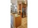 Kitchen with granite countertops, stainless steel appliances, and a breakfast bar at 2668 Jablo Cir, North Port, FL 34288