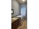 Well-equipped laundry room with a front-load washer and dryer at 2668 Jablo Cir, North Port, FL 34288