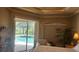 Main bedroom with access to lanai and private pool at 2668 Jablo Cir, North Port, FL 34288