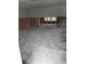 Spacious living room with exposed framing, offering a blank canvas for customization and design at 7240 Donna Dr, New Port Richey, FL 34652