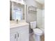 Well-lit bathroom featuring a modern vanity, updated fixtures, and a clean, functional design at 18019 Avonsdale Cir, Port Charlotte, FL 33948