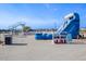 Water slide with life jackets and white picket fence in the community at 5144 Flowing Oar Rd, Wimauma, FL 33598