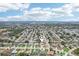 Wide aerial view of residential neighborhood with locator over subject property at 1301 Lucaya Ave, Venice, FL 34285