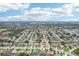 Wide aerial view of residential neighborhood with homes and tree lined streets at 1301 Lucaya Ave, Venice, FL 34285