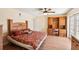 Comfortable bedroom featuring wood floors, ceiling fan, and a closet at 1301 Lucaya Ave, Venice, FL 34285