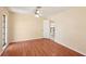 Bedroom with laminate flooring and an open doorway to the kitchen at 1301 Lucaya Ave, Venice, FL 34285