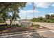 The community sign reads 'Pinebrook South, deed restricted community' with landscaping around the sign at 1301 Lucaya Ave, Venice, FL 34285