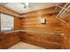 Spacious walk-in closet with wood paneled walls and wire shelving at 1301 Lucaya Ave, Venice, FL 34285