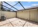 A covered patio area with brick flooring at 14174 Oakham St, Tampa, FL 33626