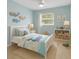 Cheerful room with whale-themed decor, playful accents, and plenty of natural light at 2824 Oaklawn Ave, Largo, FL 33771