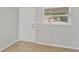 Bright entryway featuring neutral walls, tile flooring, and a white front door with natural light at 2824 Oaklawn Ave, Largo, FL 33771