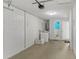 Clean, spacious garage featuring laundry, utilities, and access to a full bathroom at 2824 Oaklawn Ave, Largo, FL 33771
