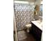Cozy bathroom includes a shower/tub combination and a vanity with storage at 3628 Nettle Creek Ct, Holiday, FL 34691