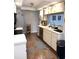 Functional kitchen featuring stainless steel appliances and ample countertop space at 3628 Nettle Creek Ct, Holiday, FL 34691