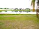 Beautiful backyard with a serene pond view, perfect for relaxing and enjoying nature at 11511 Misty Isle Ln, Riverview, FL 33579