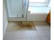 Bathroom with separate shower and bathtub needing repair at 11511 Misty Isle Ln, Riverview, FL 33579