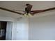 Bedroom features a ceiling fan with light fixture and trim at 11511 Misty Isle Ln, Riverview, FL 33579