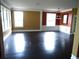 Spacious living room with natural light and hardwood floors, ideal for entertaining at 11511 Misty Isle Ln, Riverview, FL 33579