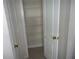 A view of the pantry with shelves at 11511 Misty Isle Ln, Riverview, FL 33579