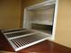 Wall-mounted access panel, possibly for utilities or storage, with a white louvered door at 11511 Misty Isle Ln, Riverview, FL 33579