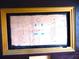 Close-up of a wall media center with wiring diagram and gold trim at 11511 Misty Isle Ln, Riverview, FL 33579