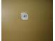 Close-up of a wall-mounted telephone or network jack with wiring inside its housing at 11511 Misty Isle Ln, Riverview, FL 33579