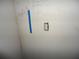 Interior wall featuring electrical outlets and handwritten notes and measurements at 11511 Misty Isle Ln, Riverview, FL 33579