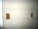 Interior wall showing drywall repairs, with visible damage and missing sections at 11511 Misty Isle Ln, Riverview, FL 33579