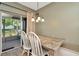 Dining area with access to the back yard and natural light at 10429 Heron Lake Dr, Riverview, FL 33578