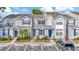 Charming townhomes with blue shutters and well-maintained landscaping offering curb appeal at 10429 Heron Lake Dr, Riverview, FL 33578