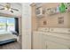 Convenient laundry room with modern appliances next to the bedroom at 10429 Heron Lake Dr, Riverview, FL 33578