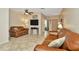 Well-lit living room with comfortable seating and neutral decor at 10429 Heron Lake Dr, Riverview, FL 33578