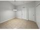 Dining room features tile flooring, modern light fixture and neutral walls at 11114 Shadybrook Dr, Tampa, FL 33625