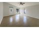Bright living room featuring tiled floors, high ceilings, and lots of natural light at 11114 Shadybrook Dr, Tampa, FL 33625