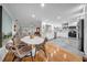 Open floor plan featuring a dining area, kitchen, and living room, perfect for entertaining at 307 N Glen Ave, Tampa, FL 33609