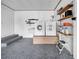 Garage laundry area features modern washer and dryer with built-in shelving at 307 N Glen Ave, Tampa, FL 33609