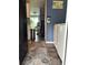 Functional laundry area with modern washer, dryer, and stylish rug, enhancing the utility space at 5258 Wisteria Cir, New Port Richey, FL 34653