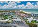 Breathtaking aerial view of a beachfront apartment complex with stunning ocean views and cityscapes at 680 71St Ave # 9, St Pete Beach, FL 33706