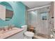 Modern bathroom with a glass-enclosed shower, updated fixtures, and stylish tile work at 680 71St Ave # 9, St Pete Beach, FL 33706