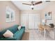 Office space featuring a futon, desk and chair with a large window at 5511 1St Avenue Nw Dr, Bradenton, FL 34209