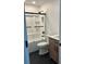 Updated bathroom features a black trimmed shower and stylish hexagon tile flooring at 821 Silver Springs Nw Ter, Port Charlotte, FL 33948