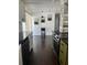 Well-lit kitchen with granite countertops, stainless steel appliances, and open layout to living space at 821 Silver Springs Nw Ter, Port Charlotte, FL 33948