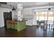 Open kitchen with a large island, modern appliances, and a sliding glass door to the patio at 821 Silver Springs Nw Ter, Port Charlotte, FL 33948