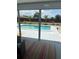 Outdoor pool and screened-in lanai provides backyard privacy and shade at 821 Silver Springs Nw Ter, Port Charlotte, FL 33948