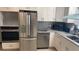 Kitchen with stainless steel appliances and granite countertops at 2580 68Th S Ave, St Petersburg, FL 33712