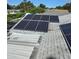 This home features a modern solar panel system for energy efficiency and eco-friendly living at 2580 68Th S Ave, St Petersburg, FL 33712