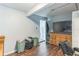A bright room with hard wood flooring has a nice dresser and attached bathroom at 5710 92Nd N Ter, Pinellas Park, FL 33782